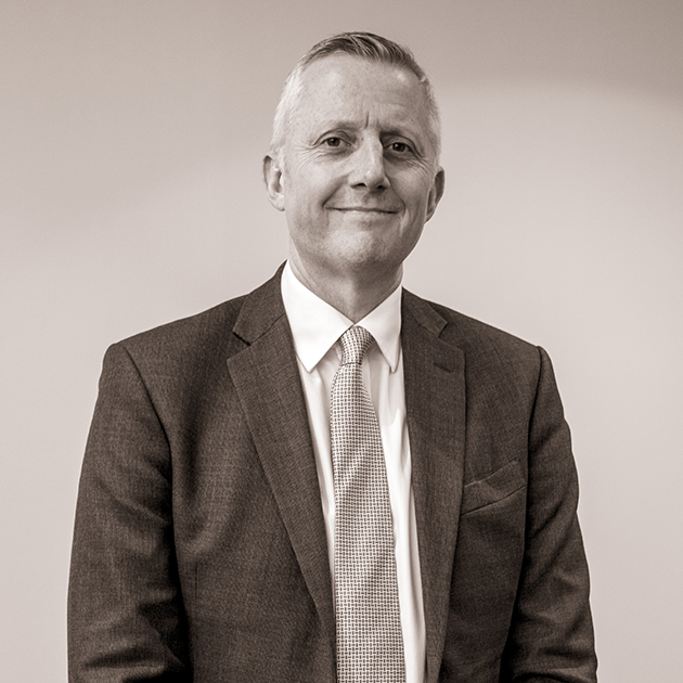 Professional half body corporate photo of Hugh Sprowson
