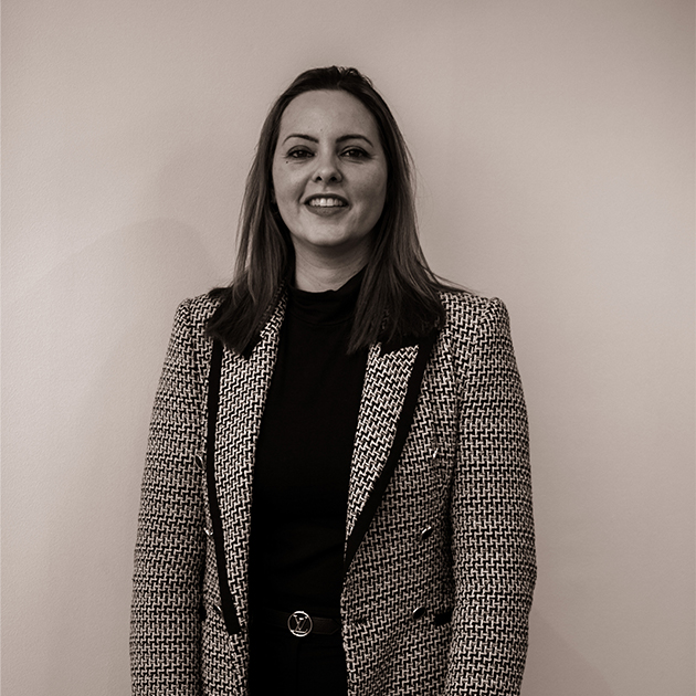 Professional half body corporate photo of Rebecca Love